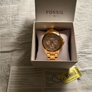 Fossil rose gold watch.